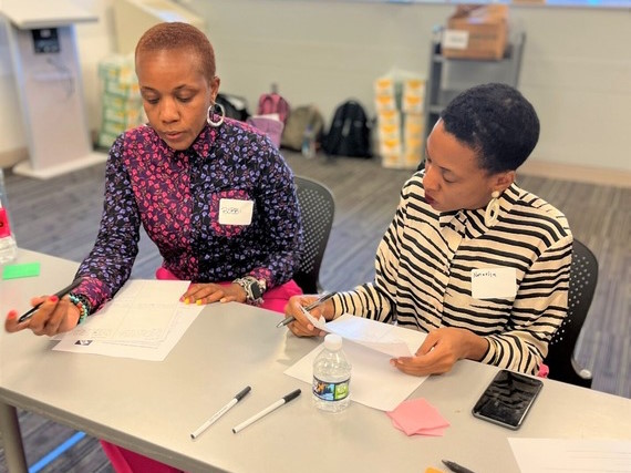 Job seekers participate in an idea creation session at Anacostia Public Library